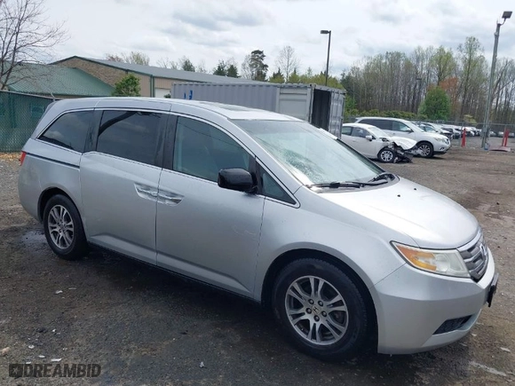 2011 Honda Odyssey EX-L with VIN 5FNRL5H69BB031983, listed as a IAAI auction lot 41947443 with 148,111 mi miles. Bid and sale history available at carsss.com. Image 1.