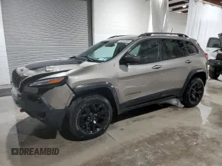 2017 Jeep Cherokee Trailhawk L Plus z VIN 1C4PJMBB4HW593615, wystawiony jako Copart lot #56342885 z przebiegiem 88 215 mil mil oraz Szkoda całkowita • Salvage title. Historia ofert i sprzedaży dostępna na DreamBid. Obrazek 1.