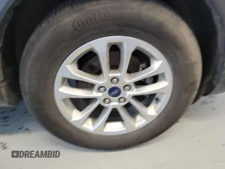 2022 Ford Escape SE with VIN 1FMCU9G68NUB32497, listed as a IAAI auction lot 42727937 with 64,577 mi miles and . Bid and sale history available at DreamBid. Image 4.