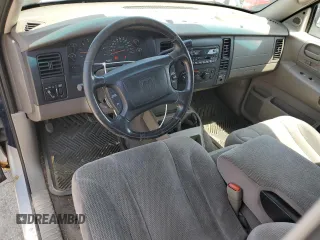 2003 Dodge Dakota SLT z VIN 1D7HL42N33S237980, wystawiony jako Copart lot #55276095 z przebiegiem 97 471 mil mil oraz Tytuł czysty. Historia ofert i sprzedaży dostępna na DreamBid. Obrazek 8.