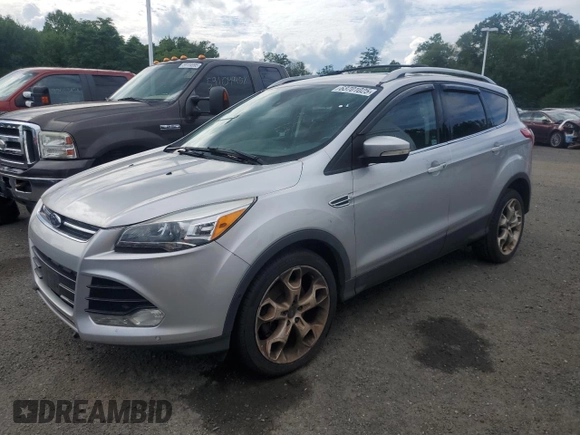 2013 Ford Escape Titanium with VIN 1FMCU9J90DUB31927, listed as a Copart auction lot 63701025 with 205,843 mi miles and Clean title. Bid and sale history available at DreamBid. Image 1.