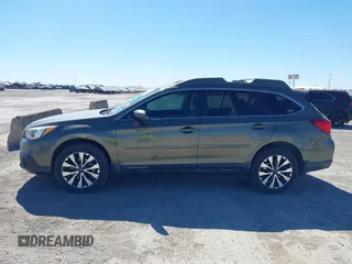 2015 Subaru Outback Limited with VIN 4S4BSBNCXF3259969, listed as a IAAI auction lot 41872999 with 144,442 mi miles and . Bid and sale history available at DreamBid. Image 14.