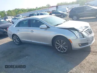 2013 Cadillac XTS with VIN 2G61N5S31D9135710, listed as a IAAI auction lot 42002480 with 162,029 mi miles. Bid and sale history available at carsss.com. Image 13.