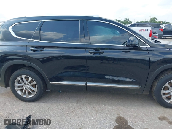 2019 Hyundai Santa Fe SEL z VIN 5NMS33AD8KH006327, wystawiony jako IAAI lot #42134349 z przebiegiem 133 961 mil mil oraz . Historia ofert i sprzedaży dostępna na DreamBid. Obrazek 13.