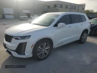 2020 Cadillac XT6 FWD Premium Luxury with VIN 1GYKPCRS7LZ122715, listed as a Copart auction lot 64907384 with 45,599 mi miles and Clean Title. Bid and sale history available at carsss.com. Image 1.