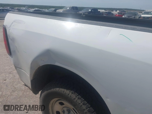 2021 Ram 1500 Tradesman with VIN 1C6RR6FG0MS524674, listed as a IAAI auction lot 42589113 with 95,899 mi miles and . Bid and sale history available at DreamBid. Image 6.