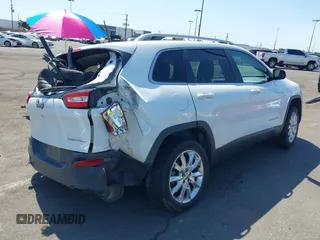 2016 Jeep Cherokee High Altitude with VIN 1C4PJLDB0GW249558, listed as a IAAI auction lot 41851549 with 128,638 mi miles. Bid and sale history available at carsss.com. Image 4.