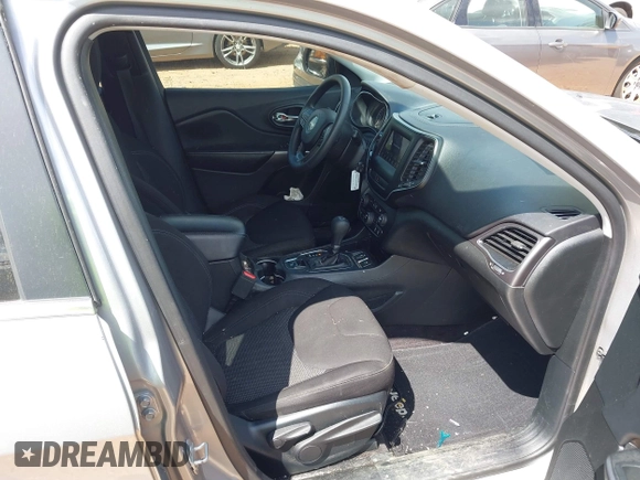 2019 Jeep Cherokee Latitude with VIN 1C4PJLCX7KD220799, listed as a IAAI auction lot 41970875 with 104,394 mi miles and . Bid and sale history available at DreamBid. Image 5.