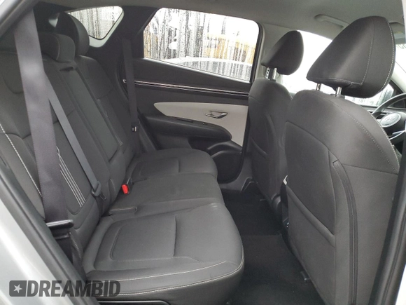 2023 Hyundai Tucson SEL z VIN 5NMJBCAE1PH195028, wystawiony jako Copart lot #53737085 z przebiegiem 61 640 mil mil oraz Szkoda całkowita • Salvage title. Historia ofert i sprzedaży dostępna na DreamBid. Obrazek 12.