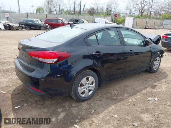 2018 Kia Forte LX with VIN 3KPFK4A77JE189410, listed as a IAAI auction lot 42070033 with 97,698 mi miles. Bid and sale history available at carsss.com. Image 4.