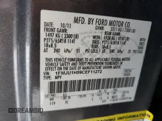 2012 Ford Expedition XLT z VIN 1FMJU1H59CEF11272, wystawiony jako Copart lot #60291415 z przebiegiem 115 410 mil mil oraz Szkoda całkowita • Salvage title. Historia ofert i sprzedaży dostępna na DreamBid. Obrazek 13.
