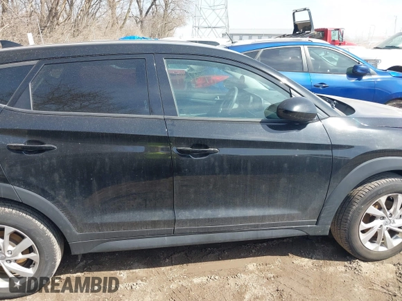 2019 Hyundai Tucson SE with VIN KM8J2CA4XKU852946, listed as a IAAI auction lot 41784214 with 120,857 mi miles. Bid and sale history available at carsss.com. Image 13.