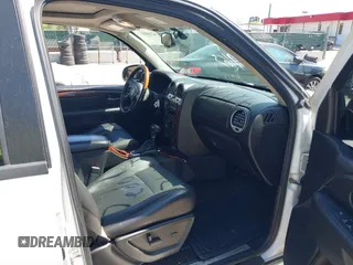 2008 GMC Envoy Denali with VIN 1GKET63M482171059, listed as a IAAI auction lot 42109163 with 173,415 mi miles. Bid and sale history available at carsss.com. Image 5.