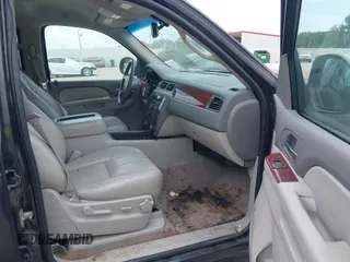 2011 Chevrolet Suburban LT with VIN 1GNSCJE07BR128885, listed as a IAAI auction lot 42456748 with 201,789 mi miles and . Bid and sale history available at DreamBid. Image 5.