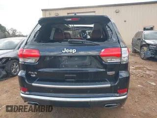 2015 Jeep Grand Cherokee Summit with VIN 1C4RJFJT1FC768707, listed as a IAAI auction lot 41863454 with 122,564 mi miles. Bid and sale history available at carsss.com. Image 16.