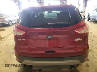 2014 Ford Escape SE с VIN 1FMCU0GX0EUB75736, выставлен на аукционе Copart как лот 57603105 с пробегом 86 480 миль миль и Списание • Salvage title. История ставок и продаж доступна на DreamBid. Изображение 6.