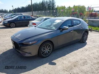 2022 Mazda Mazda3 Hatchback Premium with VIN JM1BPAML9N1518186, listed as a IAAI auction lot 42074112 with 23,722 mi miles. Bid and sale history available at carsss.com. Image 2.