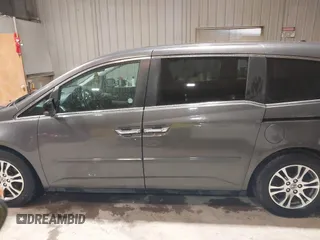 2013 Honda Odyssey EX-L с VIN 5FNRL5H63DB015989, выставлен на аукционе IAAI как лот 41832421 с пробегом 153 240 миль миль и . История ставок и продаж доступна на DreamBid. Изображение 14.
