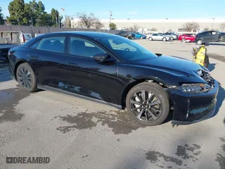 2025 Lucid Air Pure with VIN 50EA1PGA7SA004788, listed as a IAAI auction lot 41518561 with 1,872 mi miles. Bid and sale history available at carsss.com. Image 1.