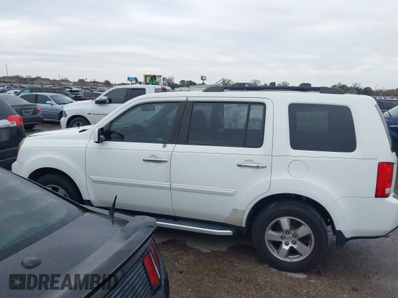 2011 Honda Pilot EX-L with VIN 5FNYF3H67BB014641, listed as a IAAI auction lot 41276698 with 193,656 mi miles and . Bid and sale history available at DreamBid. Image 14.