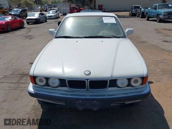 1994 BMW 7 Series z VIN WBAGD4324RDE65491, wystawiony jako IAAI lot #42761773 z przebiegiem 141 762 mil mil oraz . Historia ofert i sprzedaży dostępna na DreamBid. Obrazek 6.