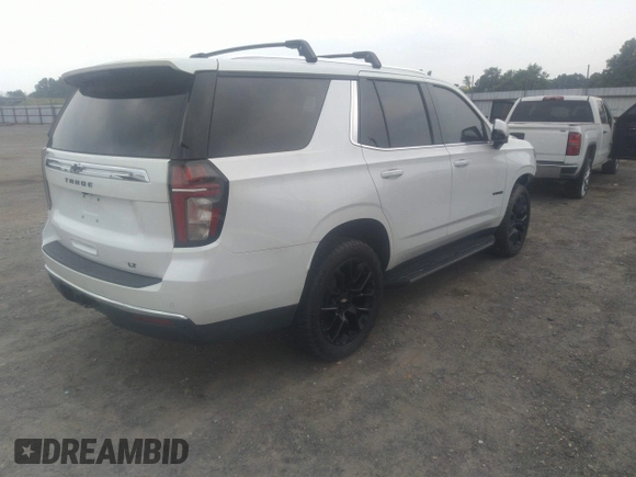 2022 Chevrolet Tahoe LT with VIN 1GNSKNKD5NR143276, listed as a IAAI auction lot 42268541 with 54,463 mi miles and . Bid and sale history available at DreamBid. Image 4.