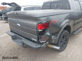 2013 Ford F-150 XL with VIN 1FTFW1CT7DFB60657, listed as a IAAI auction lot 41562282 with 121,633 mi miles. Bid and sale history available at carsss.com. Image 6.