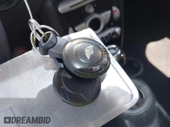 2007 MINI Hardtop with VIN WMWMF33567TU62285, listed as a IAAI auction lot 42517575 with 137,542 mi miles and . Bid and sale history available at DreamBid. Image 11.