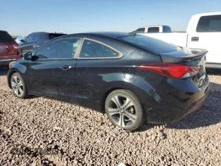 2014 Hyundai Elantra Coupe with VIN KMHDH6AH2EU029402, listed as a Copart auction lot 73036614 with 106,749 mi miles and Salvage Title. Bid and sale history available at carsss.com. Image 2.