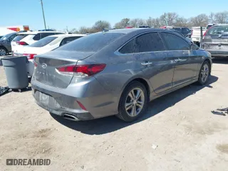 2019 Hyundai Sonata Sport with VIN 5NPE34AF8KH751764, listed as a IAAI auction lot 41751278 with 139,187 mi miles. Bid and sale history available at carsss.com. Image 4.
