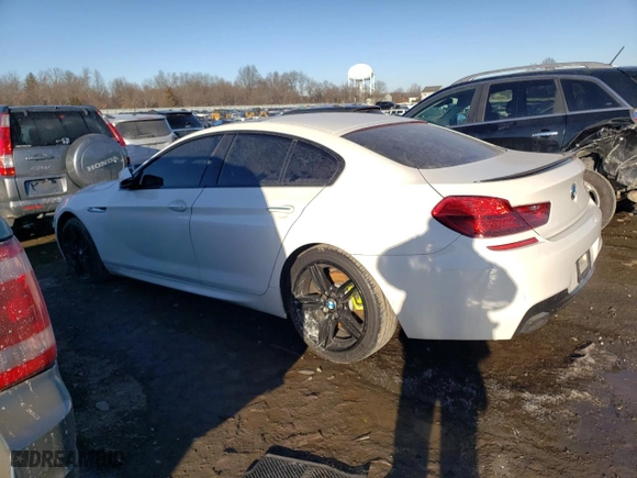 2015 BMW 6 Series 650i xDrive with VIN WBA6B4C51FD761301, listed as a Copart auction lot 42350655 with 0 mi miles and Salvage Title. Bid and sale history available at carsss.com. Image 2.