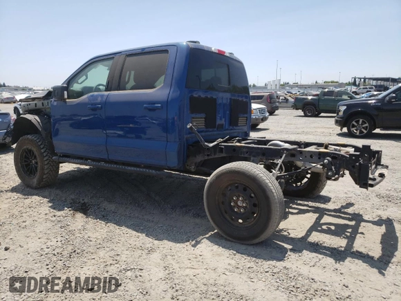 2023 Ford F-150 XL with VIN 1FTFW1E8XPKE23518, listed as a Copart auction lot 60340975 with 11,661 mi miles and Salvage title. Bid and sale history available at DreamBid. Image 2.