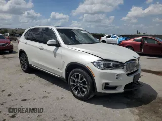 2015 BMW X5 xDrive35i with VIN 5UXKR0C52F0P07288, listed as a Copart auction lot 51697585 with 111,896 mi miles and Salvage Title. Bid and sale history available at carsss.com. Image 4.