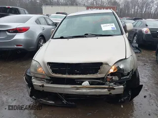 2000 Lexus RX 300 z VIN JT6GF10U0Y0055914, wystawiony jako IAAI lot #41069718 z przebiegiem 199 954 mil mil oraz . Historia ofert i sprzedaży dostępna na DreamBid. Obrazek 13.