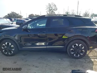 2023 Kia Sportage Plug-In Hybrid X-Line with VIN KNDPYDAH9P7027170, listed as a IAAI auction lot 41583963 with 15,276 mi miles. Bid and sale history available at carsss.com. Image 15.