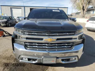 2019 Chevrolet Silverado 1500 LTZ with VIN 3GCUYGEL2KG182725, listed as a Copart auction lot 50393705 with 135,057 mi miles and Salvage Title. Bid and sale history available at DreamBid. Image 5.