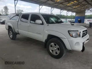 2009 Toyota Tacoma with VIN 3TMMU52N69M015298, listed as a Copart auction lot 54729255 with 341,477 mi miles and Salvage title. Bid and sale history available at DreamBid. Image 4.