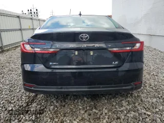 2025 Toyota Camry LE with VIN 4T1DAACK2SU569196, listed as a Copart auction lot 52728325 with Not Provided miles and Salvage Title. Bid and sale history available at carsss.com. Image 6.