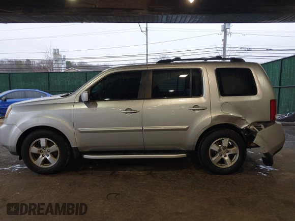 2011 Honda Pilot EX-L with VIN 5FNYF4H56BB057039, listed as a IAAI auction lot 41946647 with 187,783 mi miles. Bid and sale history available at carsss.com. Image 14.