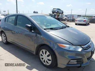 2013 Honda Insight z VIN JHMZE2H36DS006512, wystawiony jako IAAI lot #42507358 z przebiegiem 102 290 mil mil oraz . Historia ofert i sprzedaży dostępna na DreamBid. Obrazek 1.