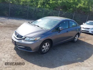 2014 Honda Civic LX with VIN 19XFB2F55EE234183, listed as a IAAI auction lot 42094263 with 148,728 mi miles. Bid and sale history available at carsss.com. Image 2.