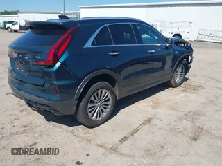 2025 Cadillac XT4 FWD Premium Luxury z VIN 1GYFZCR47SF146106, wystawiony jako IAAI lot #42324320 z przebiegiem 4 601 mil mil oraz . Historia ofert i sprzedaży dostępna na DreamBid. Obrazek 4.