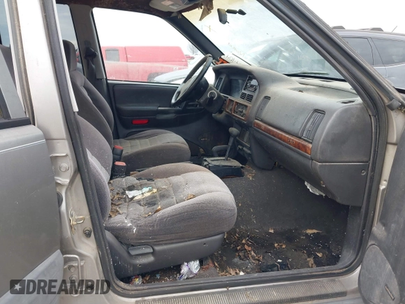 1997 Jeep Grand Cherokee Laredo with VIN 1J4GZ58S4VC745129, listed as a IAAI auction lot 41641005 with 1 mi miles. Bid and sale history available at carsss.com. Image 5.