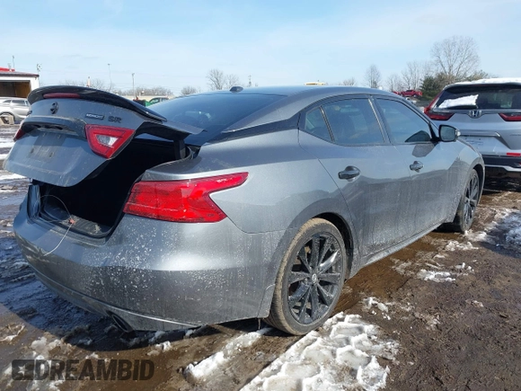 2018 Nissan Maxima SV with VIN 1N4AA6AP4JC372351, listed as a IAAI auction lot 41614526 with 70,237 mi miles and . Bid and sale history available at DreamBid. Image 4.
