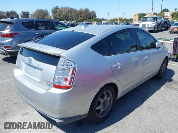 2007 Toyota Prius with VIN JTDKB20U877677686, listed as a IAAI auction lot 42234436 with 240,763 mi miles and . Bid and sale history available at DreamBid. Image 4.