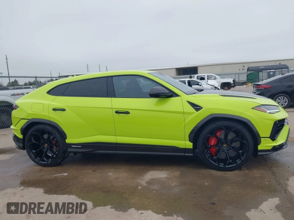2024 Lamborghini Urus Performante z VIN ZPBUC3ZL1RLA32922, wystawiony jako IAAI lot #41561732 z przebiegiem 52 mil mil oraz . Historia ofert i sprzedaży dostępna na DreamBid. Obrazek 13.