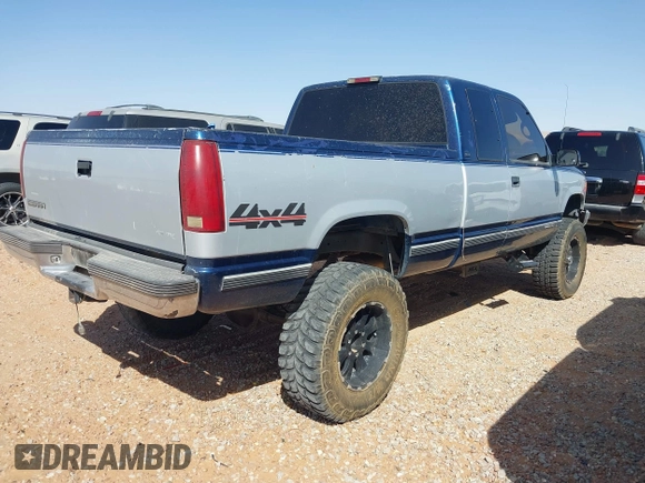 1995 GMC Sierra 1500 z VIN 2GTEK19K1S1553693, wystawiony jako IAAI lot #41742522 z przebiegiem 276 637 mil mil oraz . Historia ofert i sprzedaży dostępna na DreamBid. Obrazek 4.