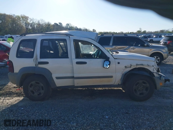 2005 Jeep Liberty Sport with VIN 1J4GK48KX5W679070, listed as a IAAI auction lot 41807899 with 157,726 mi miles. Bid and sale history available at carsss.com. Image 13.