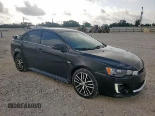 2016 Mitsubishi Lancer GT with VIN JA32U8FWXGU008597, listed as a Copart auction lot 59891435 with 131,632 mi miles and Salvage title. Bid and sale history available at DreamBid. Image 4.
