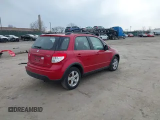 2012 Suzuki SX4 Crossover with VIN JS2YB5A36C6302368, listed as a IAAI auction lot 41657114 with 138,717 mi miles and . Bid and sale history available at DreamBid. Image 4.